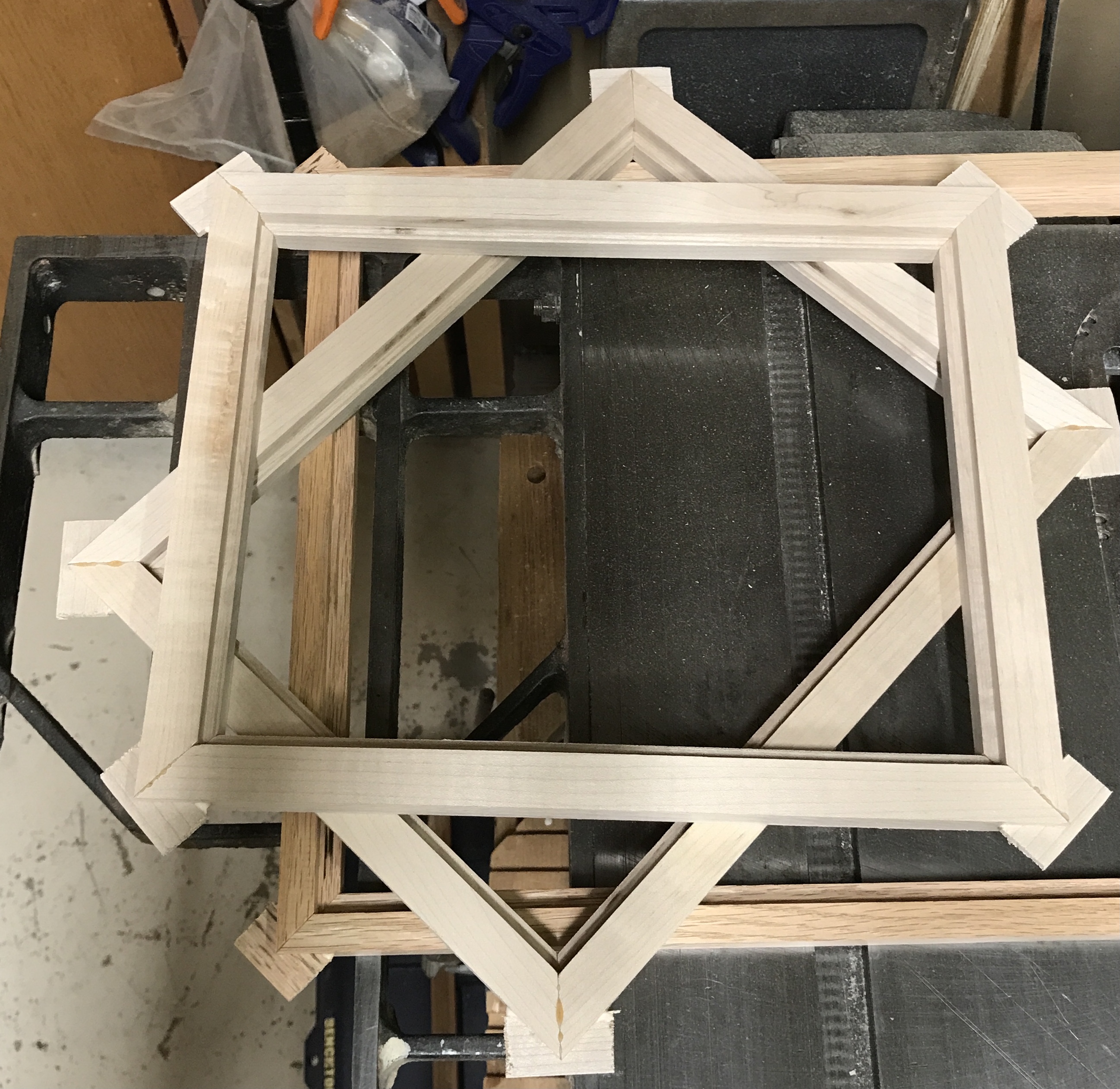 Three frames with splines glued in place